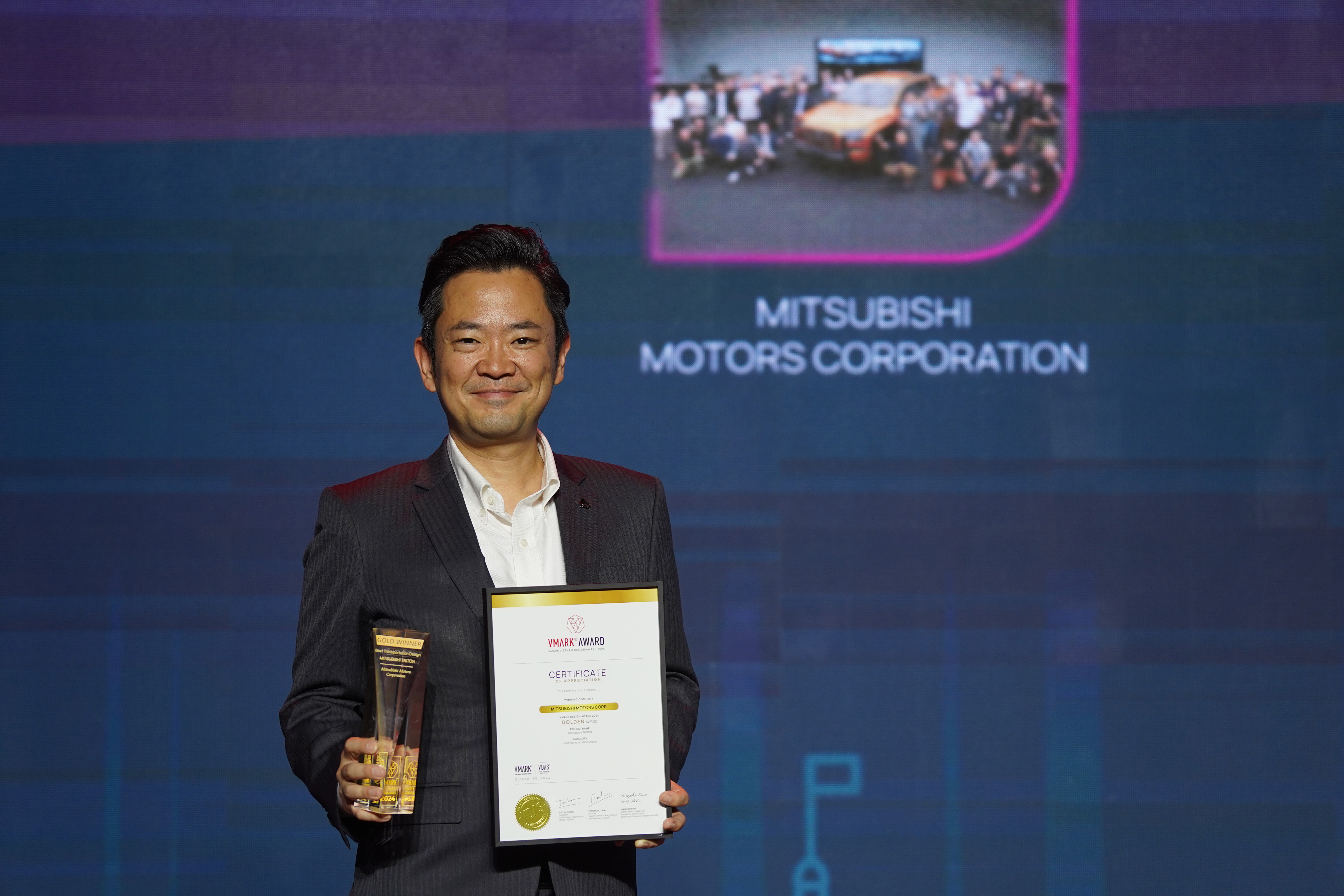 Kazuhiro Watanabe from Mitsubishi Motors Vietnam Co., Ltd. at the VMARK Vietnam Design Award 2024 ceremony