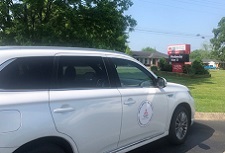MMNA lends Outlander PHEV to NGO providing free annual physicals to students before summer break